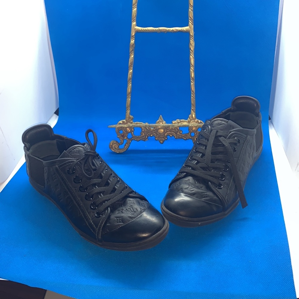 Louis Vuitton
Black Womens Leather Punchy Monogram Sneakers